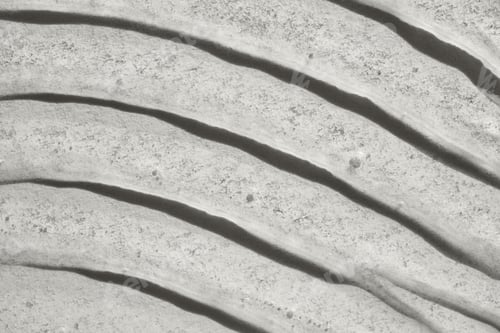 Preview: Abstract background showing curved lines on gray concrete surface