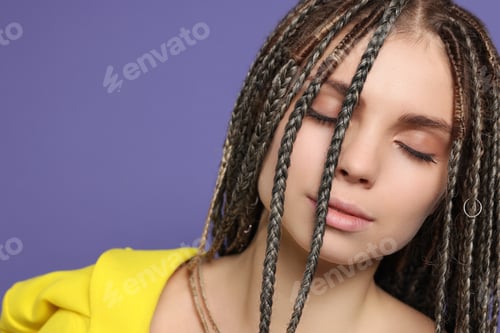 Preview: Beautiful woman with long african braids on purple background, closeup. Space for text