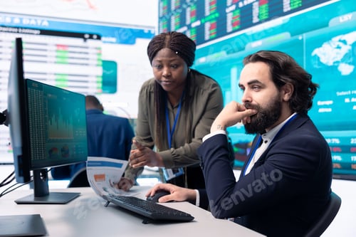 Preview: Managers collecting important statistics numbers on desktop pc