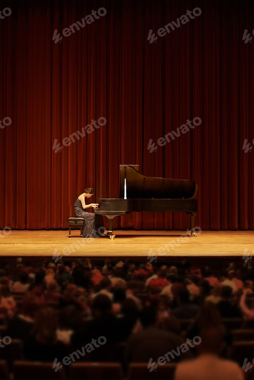 Preview: Playing for the crowd. Shot of a young woman playing the piano during a musical concert.