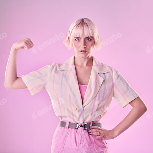 Preview: Confident Woman Flexing Muscle on Pink Background