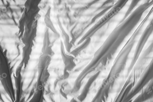 Preview: Crumpled bedding in the bedroom with sunlight in the morning