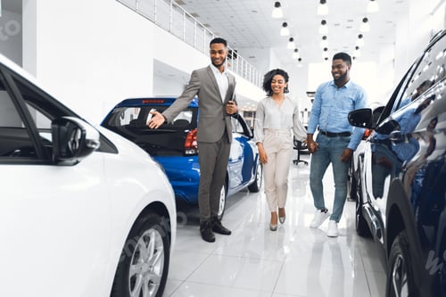 Preview: Seller Showing Luxury Car Consulting Couple In Dealership Shop