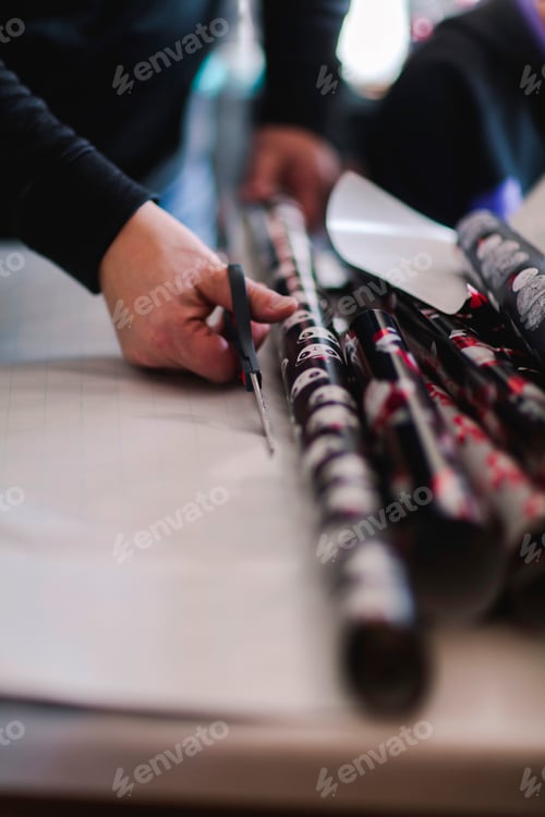 Preview: Children cutting Christmas wrapping paper