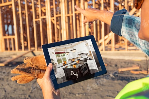 Preview: Female Construction Worker Reviewing Kitchen on Computer Pad at Construction Site