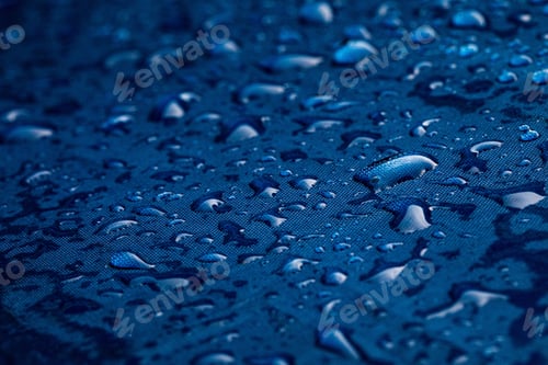Preview: Background of raindrops on a blue embrela