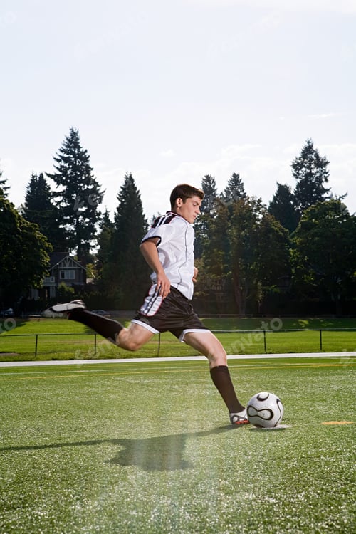 Preview: Boy playing football