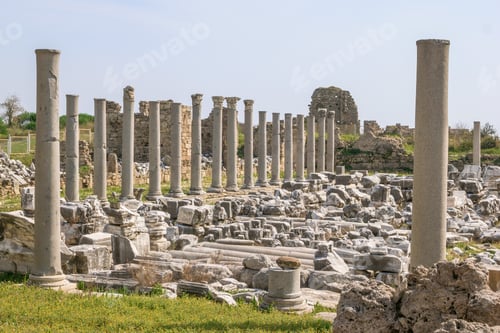 Preview: Ruins of an ancient Greek temple with columns and a stone platform.