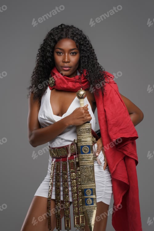 Preview: Afro-American model in Greek-style tunic with red cape and ornate belt