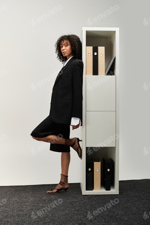 Preview: Elegance and confidence shine through in a young womans stylish business attire at work