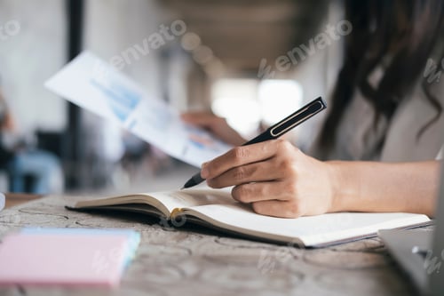Preview: Female businesswoman reading financial report analyzing statistics