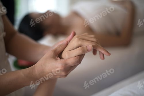 Preview: Hands massage in the spa salon relax and healthy.
