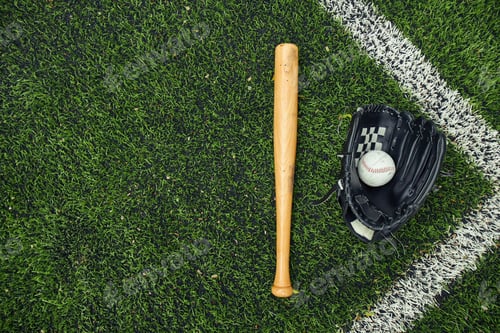 Preview: Old baseball glove and bat on field