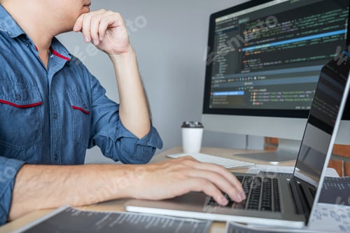 Preview: Young Professional programmer working at developing programming and website working in a software