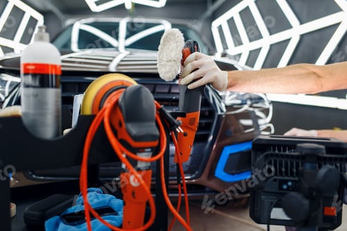 Preview: Worker, polishing machine and tools, car detailing