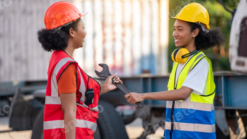 Preview: Woman Technician or maintenance worker hold mechanic tool box near old cargo container tank