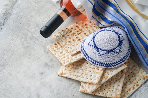 Preview: Passover celebration concept. Matzah, red kosher and walnut. Traditional ritual Jewish bread matzah,