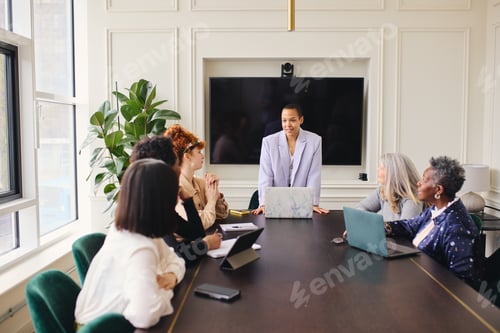 Preview: Group of Women in a Modern Conference Room