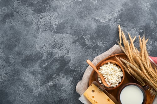 Preview: Happy Shavuot. Background for Shavuot traditional religious Jewish celebration. Milk and cheese, rip