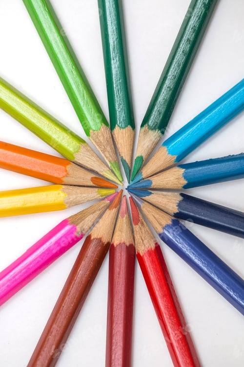 Preview: Group of color pencils on white background