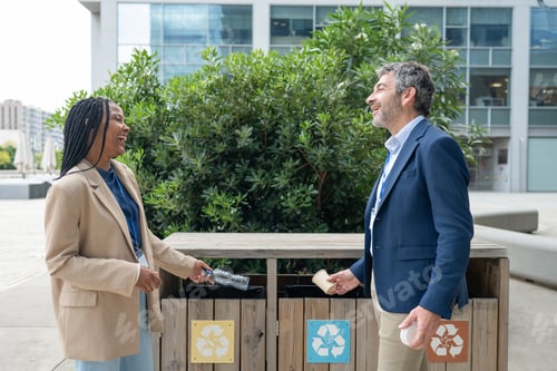Preview: Colleagues collaborating recycling plastic bottle and coffee cup