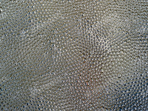 Preview: Fullframe reflection inside bubbles on the water surface