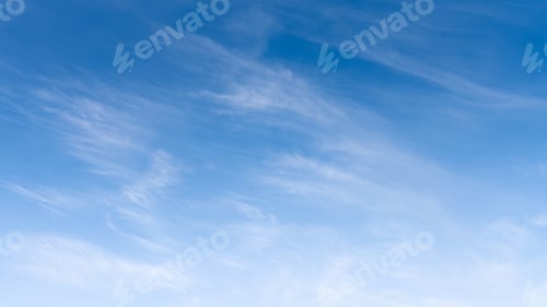 Preview: A clear blue sky with the bright sun shining vividly.