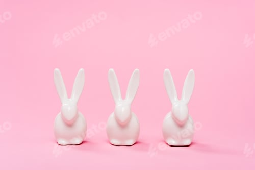 Preview: Decorative easter bunnies on pink background