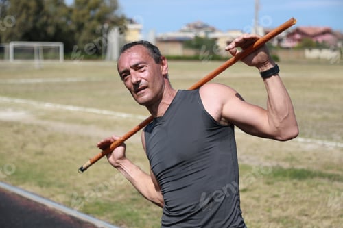 Preview: Athlete Using A Bar To Stretch
