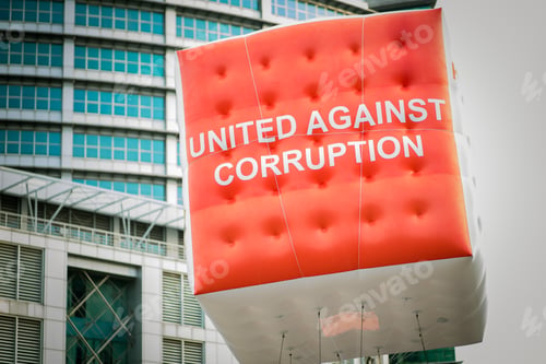 Preview: United against curroption floating balloon in the air.