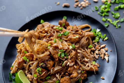 Preview: Eating pad thai with chopsticks