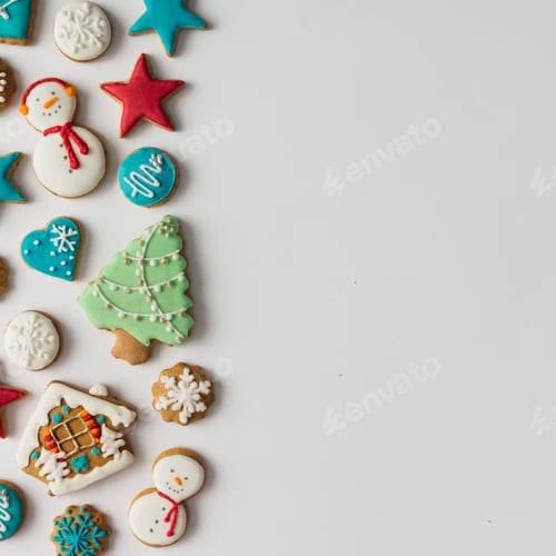 Preview: Colorful pattern made of Christmas cookies and red berries. Flat lay holiday concept.