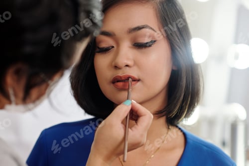 Preview: Stylist making make-up to woman