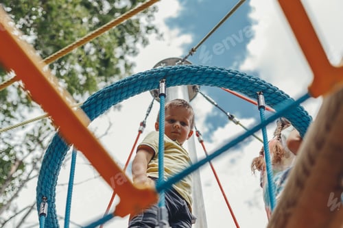 Preview: Boy playing in the playground on the street