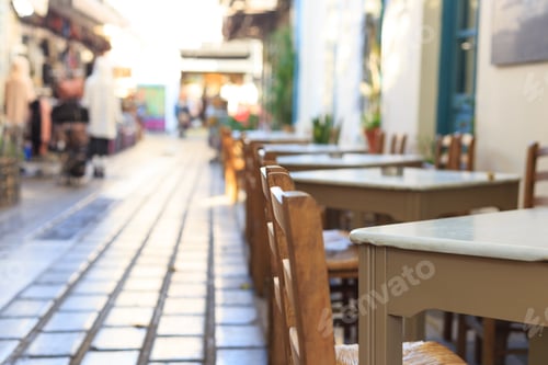 Preview: Athens, Greece. Greek tavern tables and chairs in a row