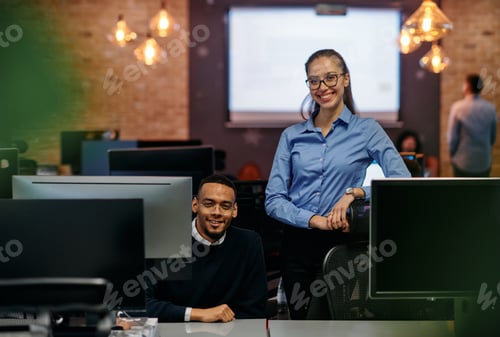 Preview: Digital Collaboration: Blonde Businesswoman and African American Partner Reviewing Documents Online