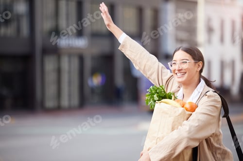 Preview: Shot of a young woman making her way home after grocery shopping