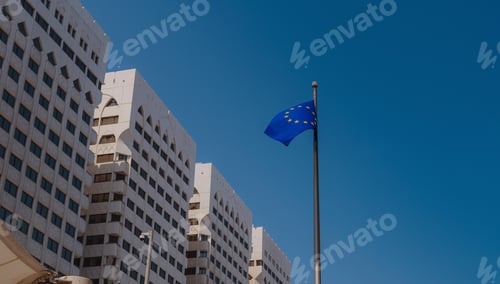 Preview: EU flag in blue sky background.