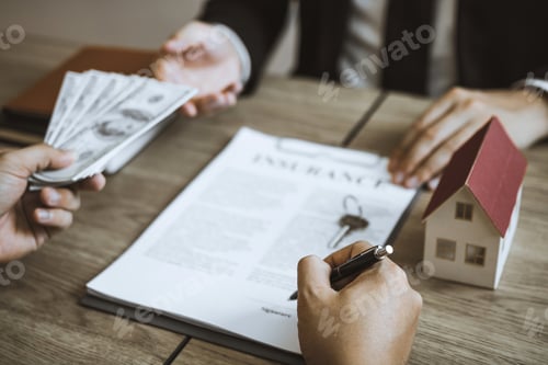 Preview: Investors are using st pen on the contract paper about buying a new home while filing cash