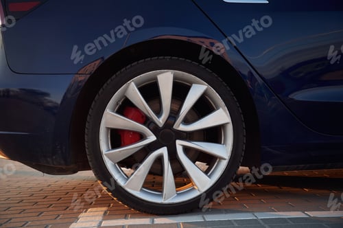 Preview: Close up side view of the rear wheel of the modern car