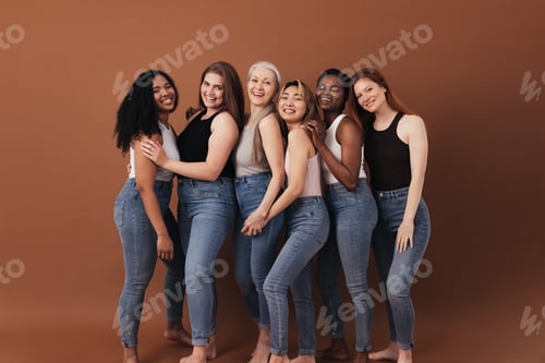 Preview: Six women of different ages and body types smiling and laughing over brown background