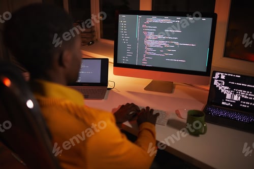 Preview: African-American IT Developer Writing Code