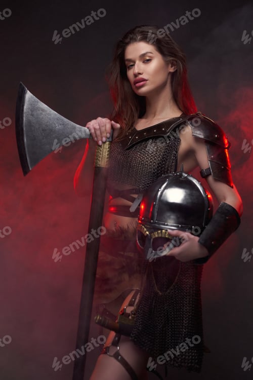 Preview: Nordic woman barbarian with axe in fog