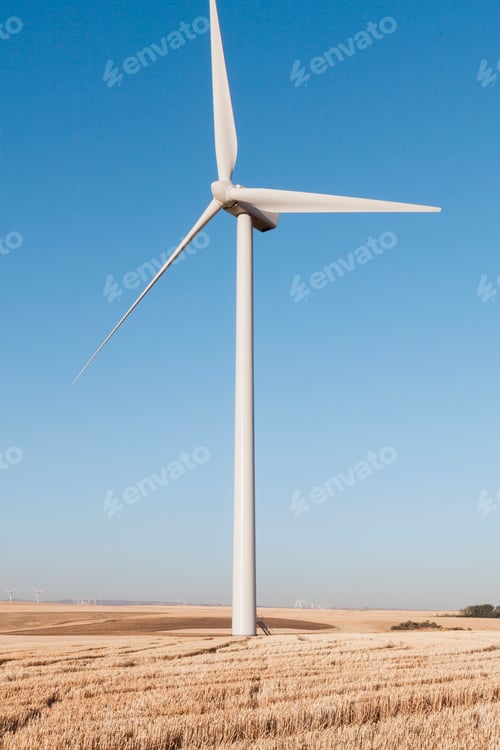 Preview: Tall wind turbines in open country farmland in Washington.