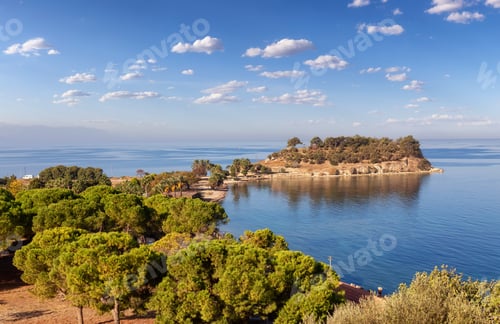 Preview: Trees and Beach on the Coast in a Touristic Town by the Aegean Sea. Kusadasi, Turkey.