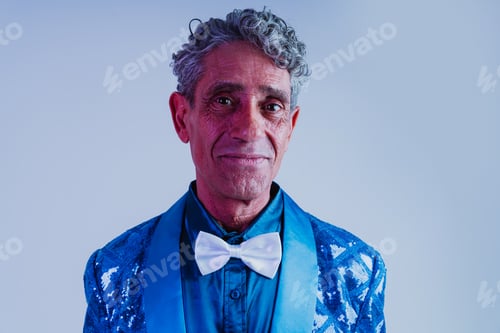 Preview: Senior man posing in studio.