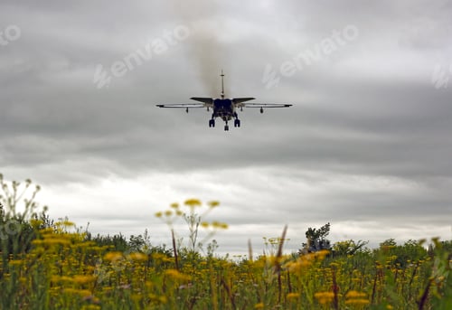 Preview: Military jet bomber Su-24 Fencer flying above the clouds.