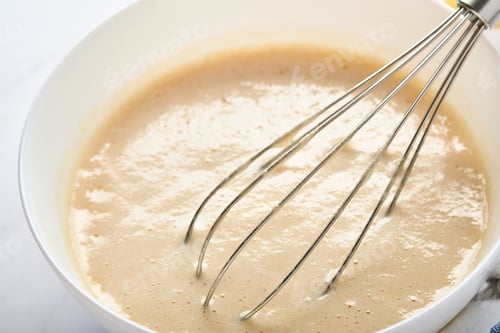 Preview: Preparation of dough for home pancakes for Breakfast or for Maslenitsa. Ingredients on the table whe