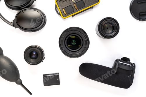 Preview: Arranged photography tools isolated on white background. Top view.