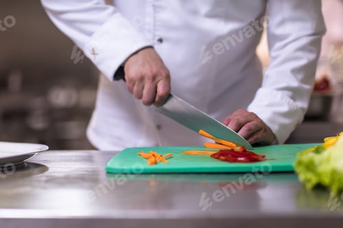 Preview: Chef hands cutting fresh and delicious vegetables
